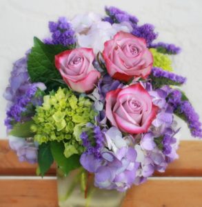 pink roses and purple and green hydrangea